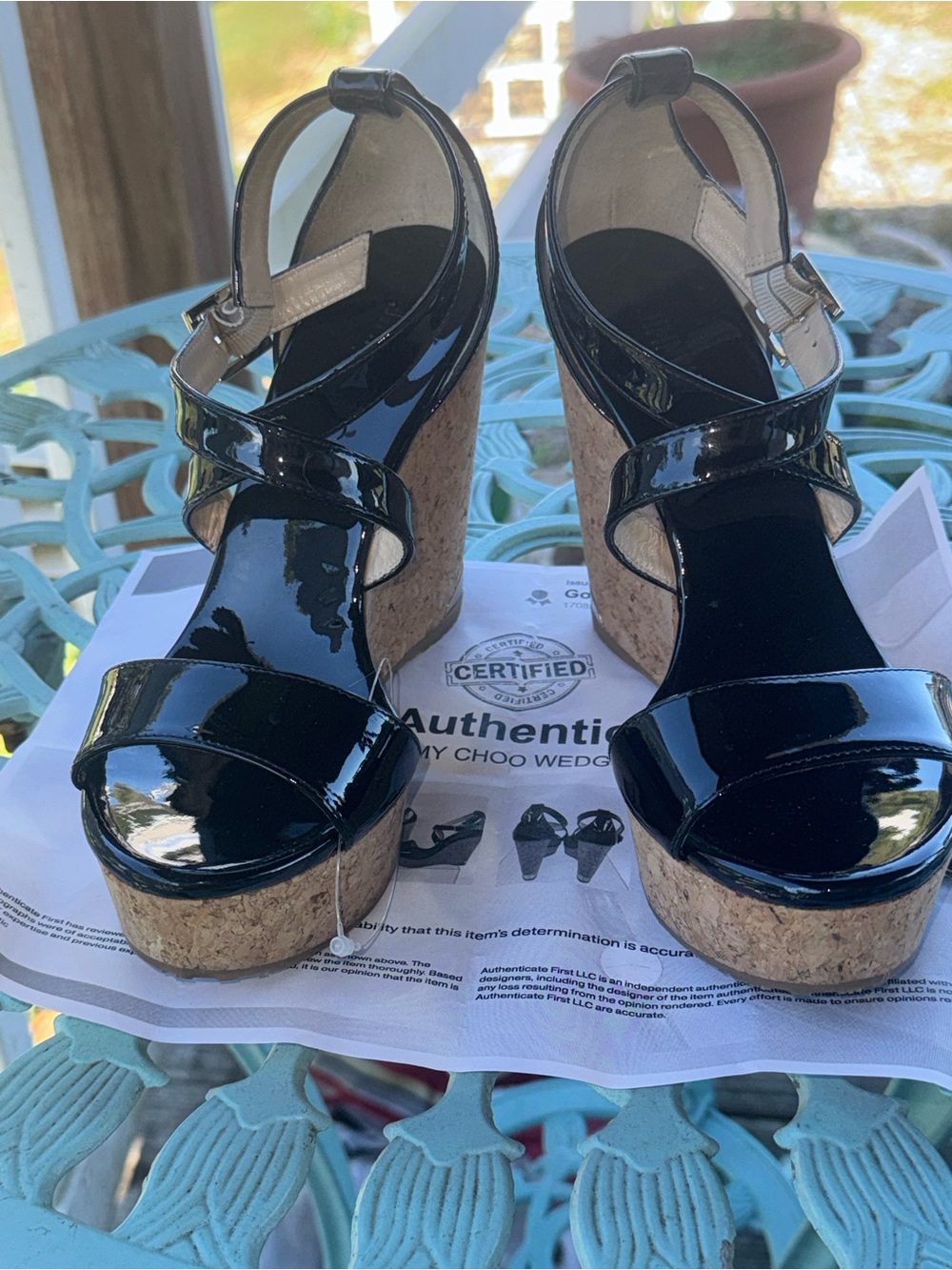 Patent  leather wedge sandals from Jimmy Choo's Portia line. 5.5